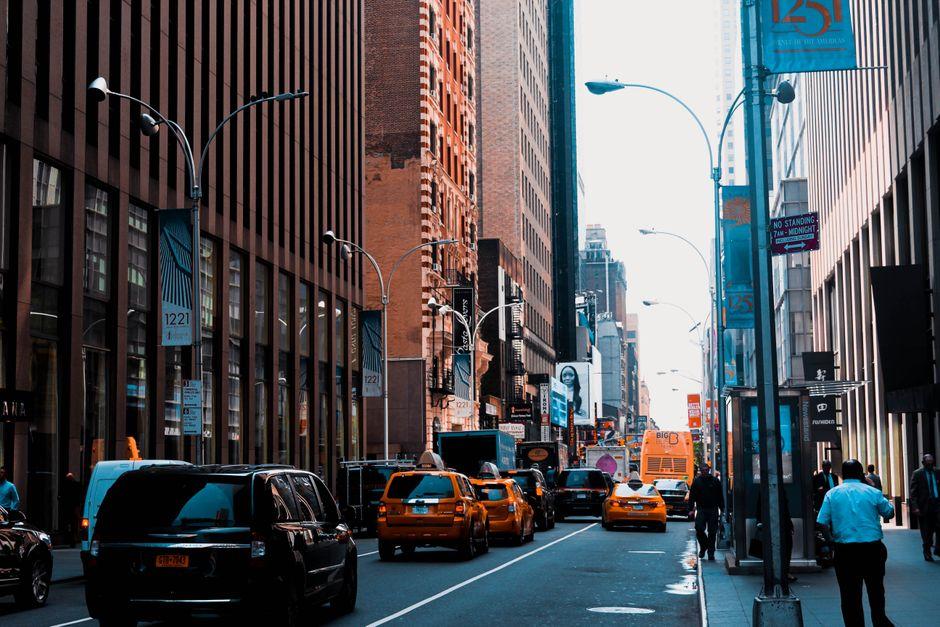 Cars on Road near Buildings